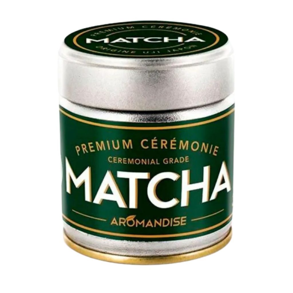 Aromandise Ceremonial Matcha i en dåse med gyldne og grønne detaljer.