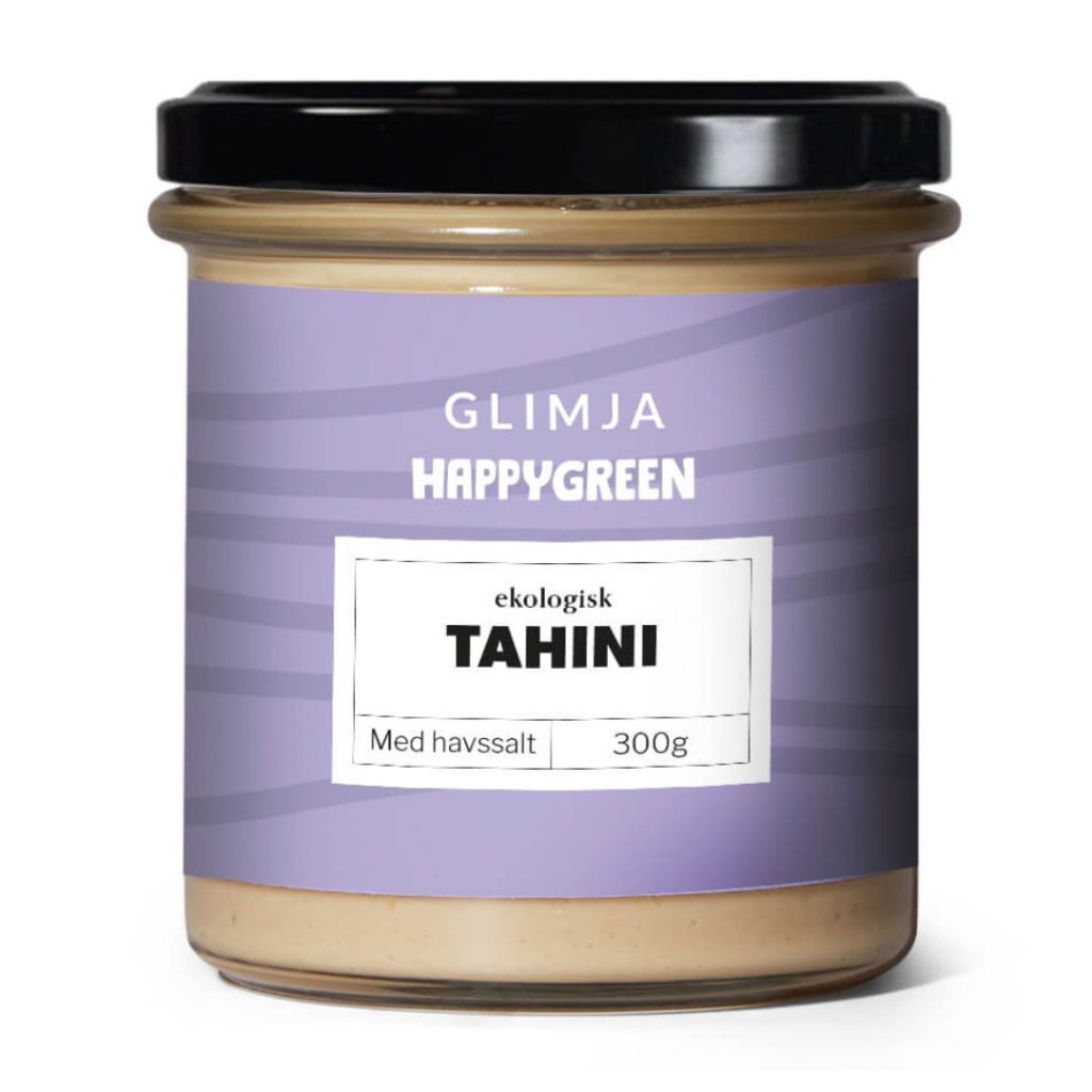 Et glas Glimja Happy Green Økologisk Tahini med havsalt, 300 g.