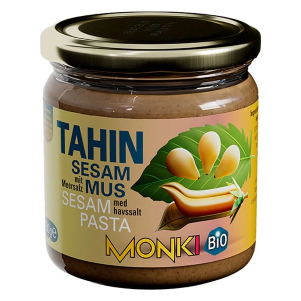 Monki Tahin med havsalt i en glasbeholder.