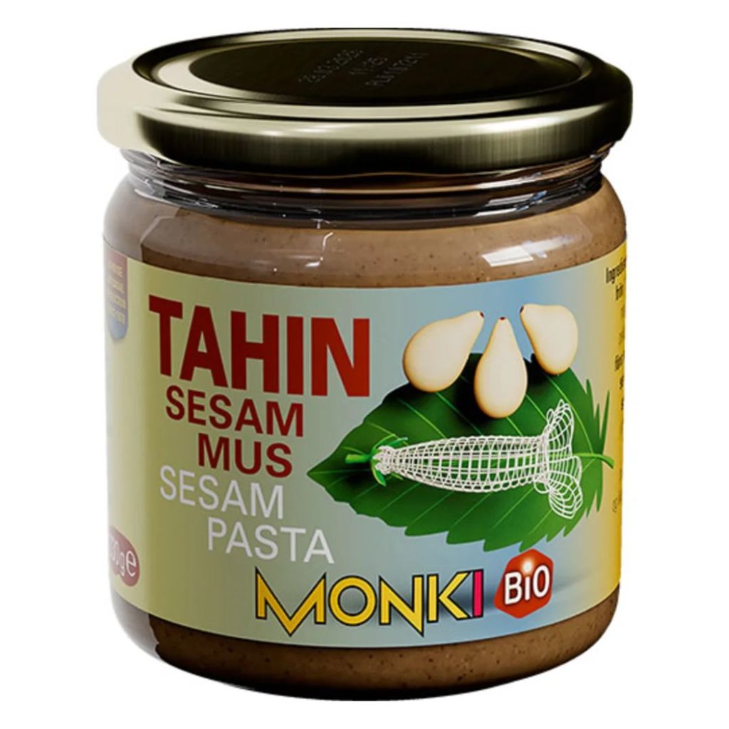 Monki Tahin uden salt i en glasbeholder.