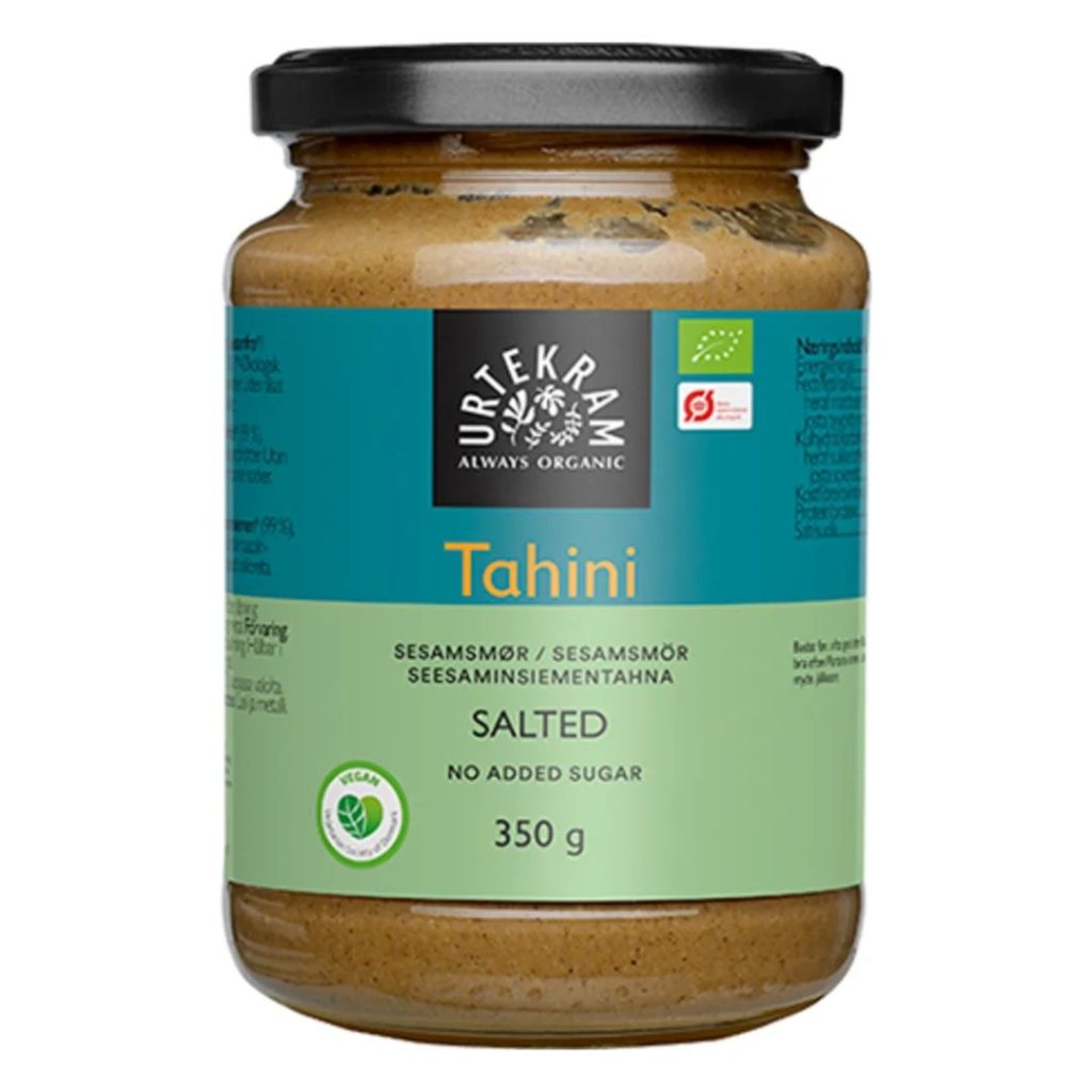 Urtekram Økologisk Tahin med salt i en glasbeholder.