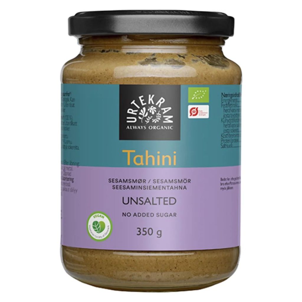 Urtekram Økologisk Tahin uden salt i en glasbeholder.