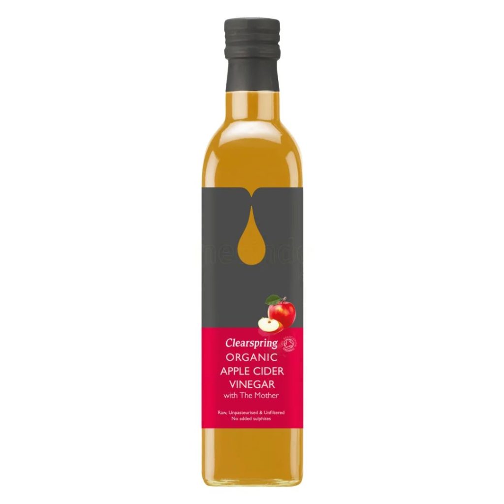 Clearspring Organic Apple Cider Vinegar i en slank glasflaske med rød etiket.