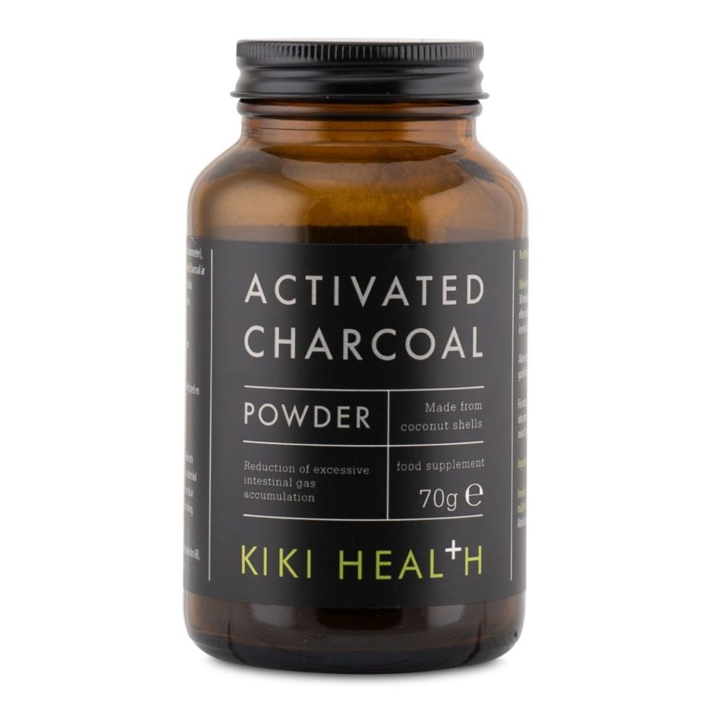 Kiki Health Activated Charcoal Powder i en brun glasbeholder, 70 gram aktivt kulpulver.