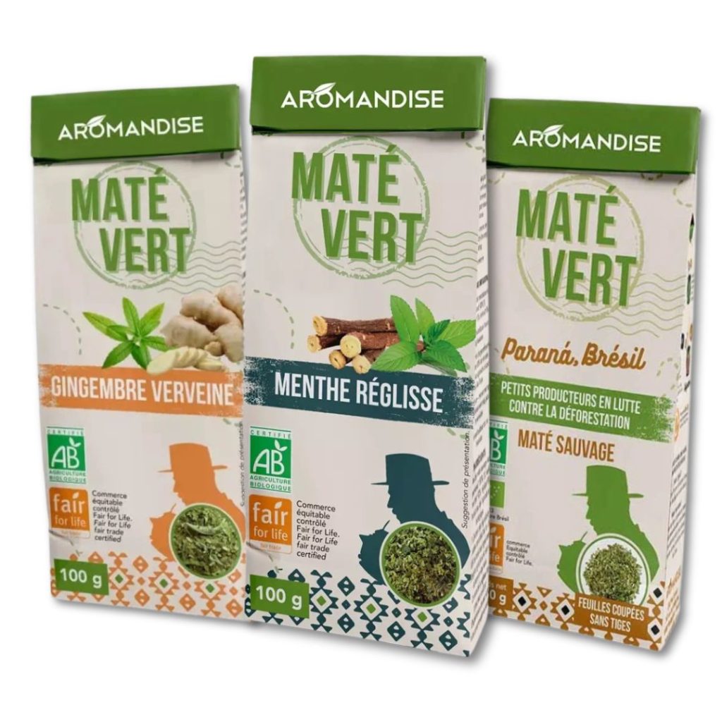 Tre papæsker med forskellige smagsvarianter af økologisk mate, herunder ingefær, lakrids og ren grøn mate.