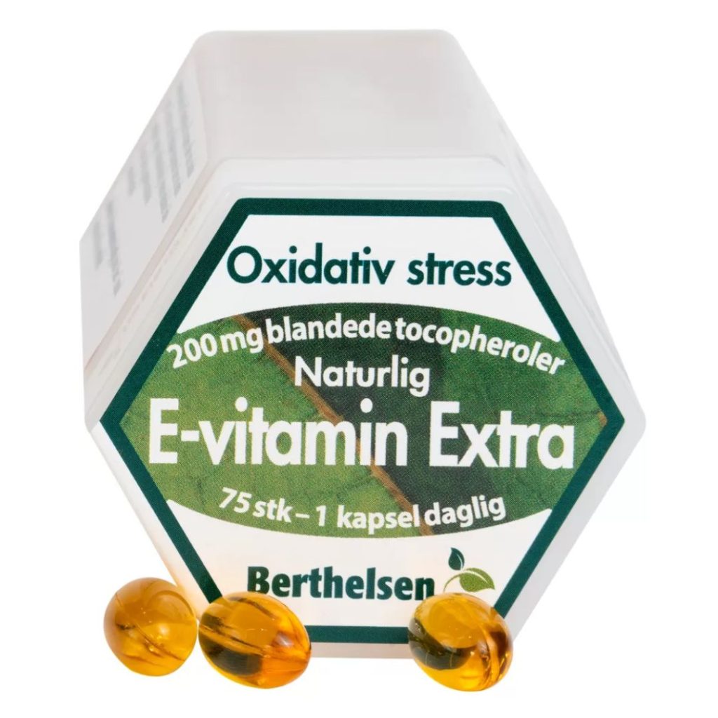 Hvid krukke med grøn etiket, der viser "Berthelsen E-vitamin Extra 200 mg", omgivet af gule kapsler.