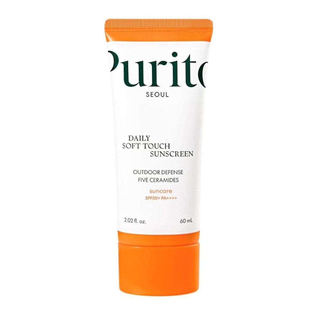 Purito solcreme i hvid og orange tube med grøn tekst.